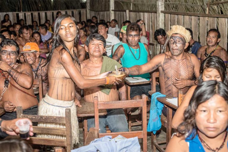 Munduruku Indians meet to decide strategy regarding one of the four dams being built on the Teles Pires River, September 2014. Those dams would be vital to a future industrial waterway in the Amazon that would transport soy from Mato Grosso state downriver eventually to the Atlantic. The Indians have repeatedly won lawsuits against the dams. But the decisions have all been overruled by higher courts, using the “suspension of security” legal provision, a relic of Brazil’s military dictatorship that can be used to overthrow virtually any lower court decision. Photo: Mauricio Torres