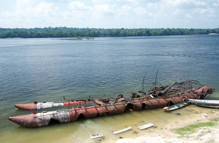 Remains of the gold mining barge after it was burnt by the police during the Eldorado Operation. Photo: Mauricio Torres 