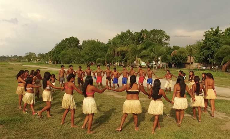 A traditional Munduruku dance. Hundreds of thousands of Indians live on indigenous lands in Brazil, but much of that land has never been officially demarcated due to decades of government delay. From April 24-28, indigenous groups from all over the country will gather in Brasilia to protest against the Temer government’s indigenous policies. Photo: Thais Borges 