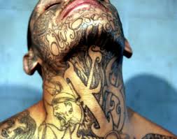 'Mara' gang member with typical tattoos