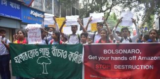 members of Gachh Banchao demonstrate outside the Brazilian consulate in Kolkata. Image: Mehanati